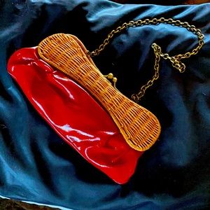 Darker red wicker purse by savoy